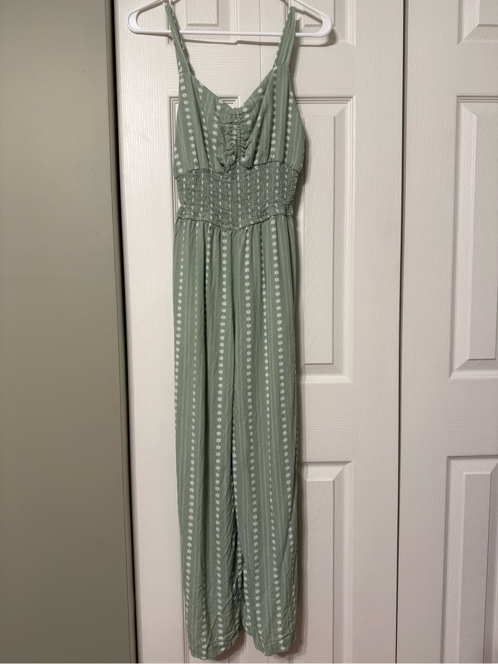 Light Sage Green Smocked Jumpsuit with floral pattern